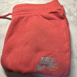 Pink Nike glitter logo joggers